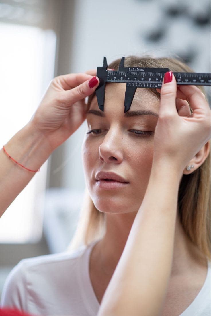 Eyebrow hair transplant procedure at a professional hair restoration clinic in Lahore